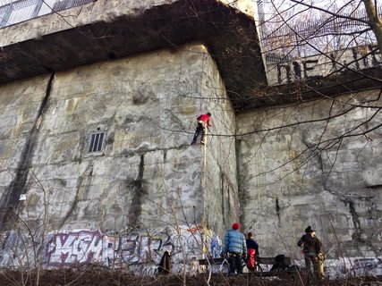 People rock climbing in a Berlin park.
