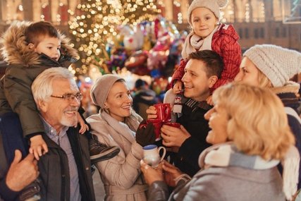 Happy family at the Christmas market