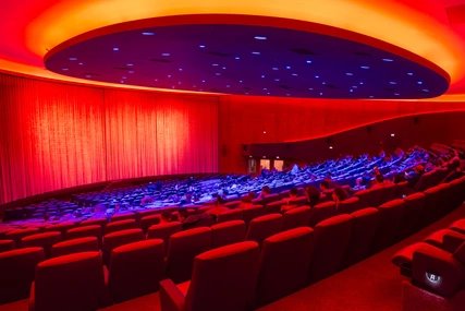 Cinema auditorium in Zoopalast with red lighting