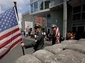 Berlin Wall, US soldiers at Checkpoint Charlie after 1989